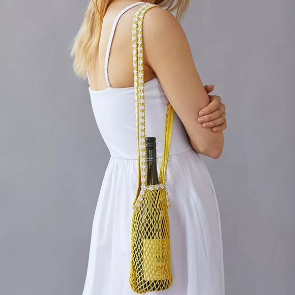 Urban Outfitters Handbags - UO Urban Outfitters Bottle Carrier Yellow Daisy Trim Woven Market Bag Festival